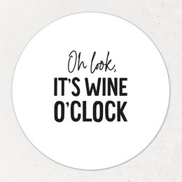 Circular magnet with text "Oh look, it's wine o'clock" in black text on a white background.