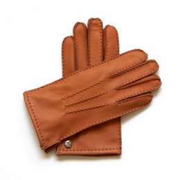 Tan leather gloves with a sporty and elegant design, suitable for various occasions.
