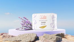 Lavender scented Aleppo soap, handmade with natural ingredients, rectangular shape, purple and green packaging.