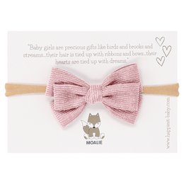 Pink bow headband for kids. Soft, stretchy material. Adorable bow design with a cute metal charm. Perfect accessory for any outfit.