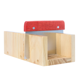 Wooden soap cutter with red handle. Rectangular shape with wooden blocks for cutting soap bars.