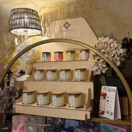  Soy wax scented candles set, wooden display, multiple colors, round jars, natural fragrance bundle.