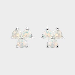 Silver statement earrings with round white opal stones set in claw settings.
