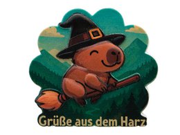 A small, white, fluffy sheep figurine with a round body and short legs, sitting on a grassy base.