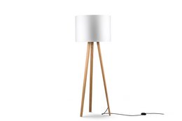 Tall, cylindrical floor lamp with a white shade and wooden tripod base. Provides ambient lighting for living spaces.
