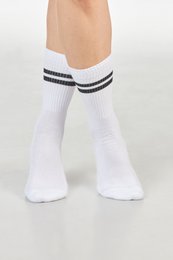  White socks with black stripes, suitable for casual or athletic wear.