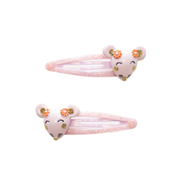  Pink hair clips with heart-shaped charms and rhinestones.