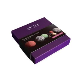 Luxury box of premium organic chocolate truffles, 135g. Assorted flavors and shapes, including round, oval, and heart-shaped chocolates in dark, milk, and white chocolate varieties.