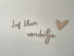 Wooden text 'Sweet little miracle'