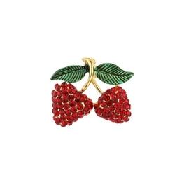 Red raspberry brooch with green leaves, gold-tone metal, fruit-shaped jewelry accessory