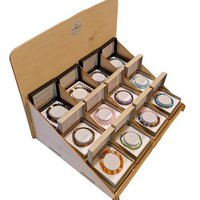 Display with variation of women's and men's bracelets of natural stone