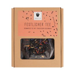  Festive tea blend with a mix of black tea, hibiscus, and other spices, packaged in a cardboard box.