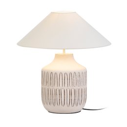 A white ceramic table lamp with a textured pattern and a white lamp shade. The lamp has a simple, modern design and would be suitable for use in a variety of home decor styles.