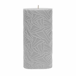  A tall, cylindrical light grey candle with a textured wave pattern design.