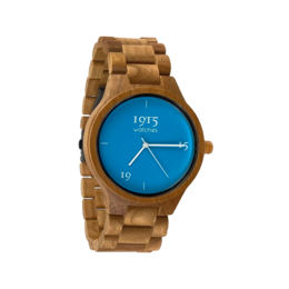A wooden watch with a blue dial and a 46mm case size, designed with a classic and minimalist style.