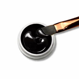 Black no-wipe gel nail polish in a 5ml jar. Glossy, long-lasting color that does not require a topcoat.