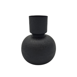 A tall, round black vase with a cylindrical shape.