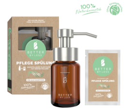 Glass bottle with silver pump head, shampoo, natural and organic ingredients, gentle cleansing formula.