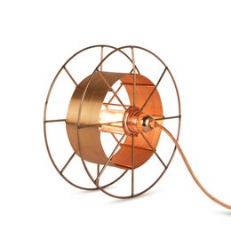A round, industrial-style floor lamp with a bronze-colored metal frame and an orange glass shade. The lamp has a unique, vintage-inspired design with an exposed bulb and a circular frame.