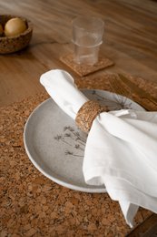  Round napkin rings, cork material, neutral earth tones, set of 4, minimalist design, table setting accessories.