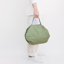  Compact foldable shopping bag in a forest green color, made of durable material with a pleated design for easy storage.