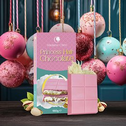 Chocolate gift set with angel hair chocolate and cotton candy. Includes pink and teal packaging with a whimsical design.