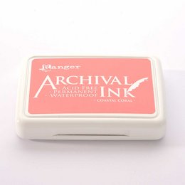 Coral-colored archival ink pad for crafting and scrapbooking, featuring a rectangular shape and the brand name "Ranger" printed on the surface.