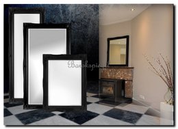 Black framed mirror with various size options, suitable for wall decor in modern home interiors.