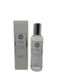 A 100 ml room spray with a scent of oud and rose from Damascus. The spray features a sleek, minimalist design and is packaged in a gray box.