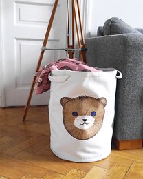 A white fabric storage basket with a cute teddy bear design. The basket has a round shape and appears to be made of a soft, durable material.