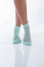 Turquoise ankle socks with a soft, fuzzy texture.