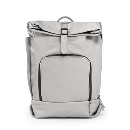 A large, gray leather backpack with a minimalist design and a flap closure.