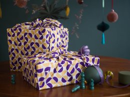  Furoshiki 3 Pack - Single Sided - Gold Moons - FabRap. Wrapping paper with a repeating pattern of purple and gold geometric shapes.