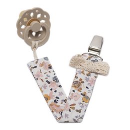 Pacifier holder BOHO FLOPI Sand, a stylish and functional accessory for parents. The pacifier holder features a floral and polka dot pattern in neutral tones, with a pacifier clip for secure attachment.