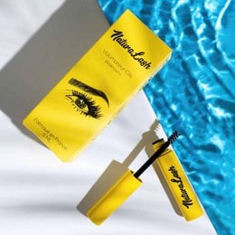 Eyelash volumizer 5ml, a product for eye makeup that enhances lash volume and length. Features a yellow packaging with an image of eyelashes.