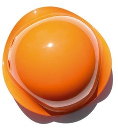 Bright orange sensory toy with a unique curved shape and smooth surface. Designed to encourage tactile exploration and sensory stimulation.