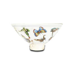 Small decorative bowl with colorful butterfly and insect designs.