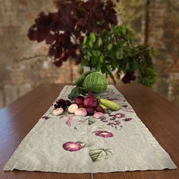  Linen table runner with floral design featuring vibrant colors, various shapes, and natural textures. Includes leaves, flowers, and fruits in a rustic, botanical arrangement.