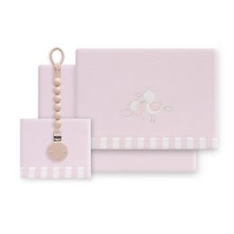 Soft, cozy coral fleece bedding set for a cot, including a sheet, fitted sheet, and pillowcase. Includes a pink pacifier holder with a bear design.