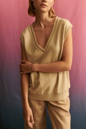 Beige women's pullover sweater with a cowl neck design, available in sizes XS to XL.