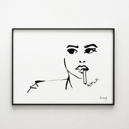 Black and white line art print of a woman's face with the text "Don't You Dare" above it. The print has a minimalist, abstract style.