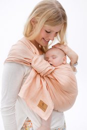 Soft, cozy peach-colored swaddle wrap for newborns. Made of high-quality, breathable fabric in roségold and grey color variants. Provides a secure, comfortable fit for your little one.