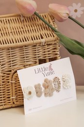  Set of 3 Noa hair clips in neutral colors, featuring a floral design and a textured finish.