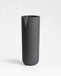 Dark gray ceramic vase with vertical ribbed texture, cylindrical shape, and 750 ml capacity.