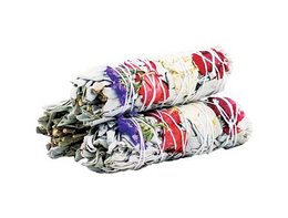 Sage incense sticks in a bundle, with a variety of colors including purple, red, and white. The incense sticks have a cylindrical shape and appear to be tied together.