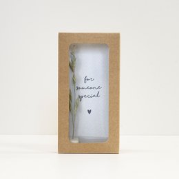 A small, rectangular wooden box with a glass front, containing a dried flower arrangement and a handwritten message that says "for someone special".