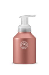 Aluminum bottle with foam pump in terra color, hand soap product.