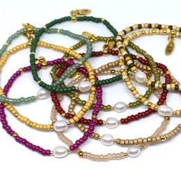  Miyuki stretch bracelet with freshwater pearl, featuring a variety of colors including multi-color, sea green, spruce green, jujube red, celery green, fuchsia, matte gold, matte champagne, jasmine rose, and ivory. The bracelet is made of beads and has a stretchy design for a comfortable fit.