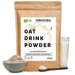 Organic oat milk powder in a paper bag. The powder is light in color and has a smooth, fine texture. The product is labeled as "Oat Drink Powder" and is part of the "Fairnatural" brand, indicating it is an organic and natural product.
