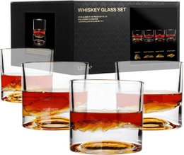 Glass decanter set with 1.0L decanter and 4 matching glasses, packaged in a gift box.